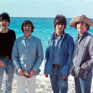 The Beatles begin their transition from up-beat commercial pop